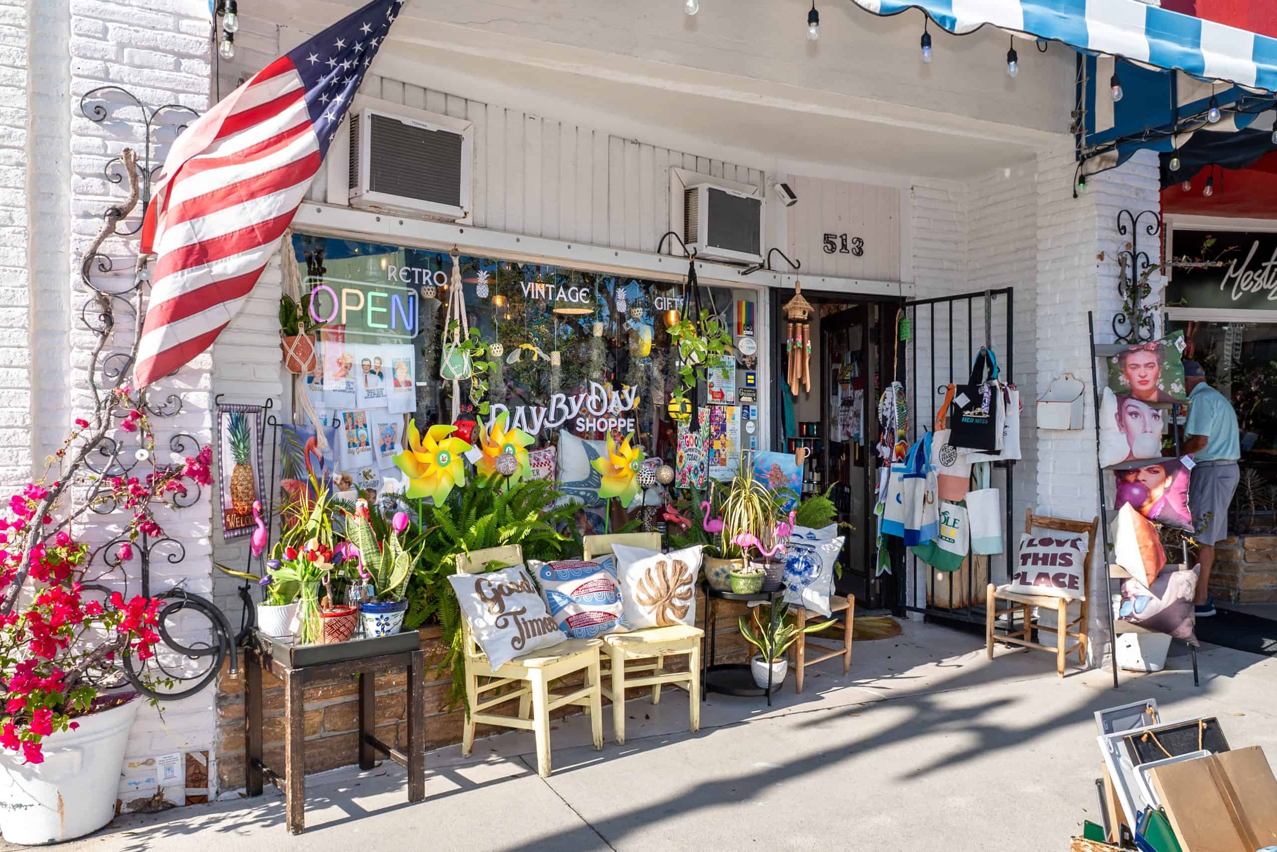 Vintage shop in Northwood Village. Storefront with outdoor display and American flag.